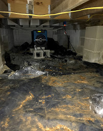 Photo: A common sight in coastal communities: crawl space with dehumidifier.